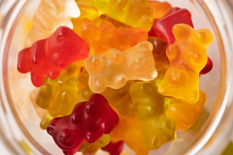 assortment-delicious-gummy-bears-with-glass-jar_23-2149894254