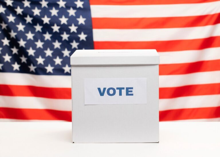 front-view-white-ballot-box-american-flag_23-2148333533