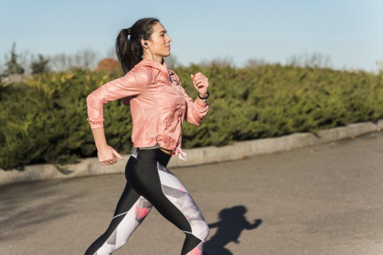 portrait-fit-woman-jogging-park_23-2148381931