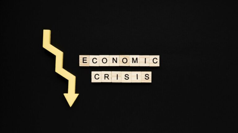 economic-crisis-bocks-with-decreasing-arrow_23-2148542038